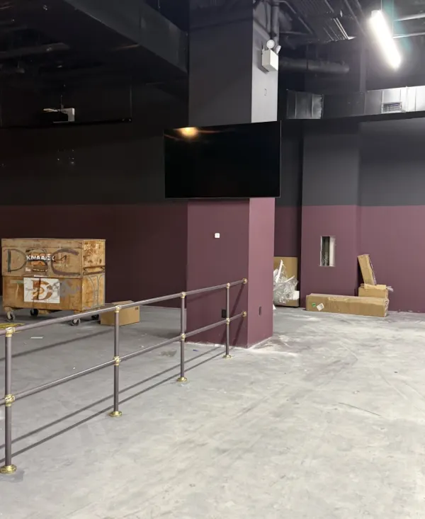 Ceiling projector, drop-down screen, and in-ceiling speakers installed by BVTech LLC at a San Antonio venue — Jordan Polasek BVTech LLC